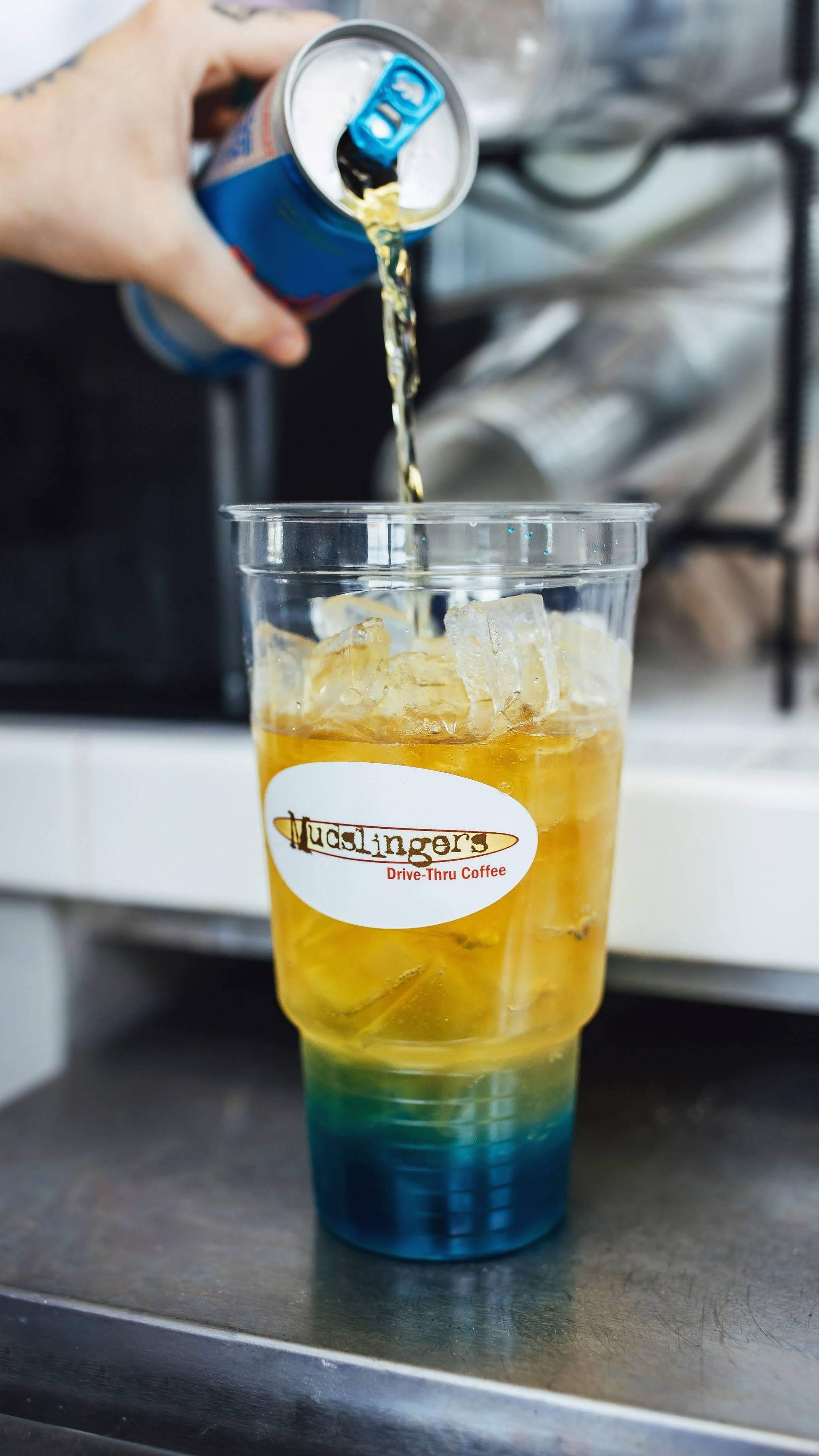 Red Bull being poured into Mudslingers Lightning Bolt Drink